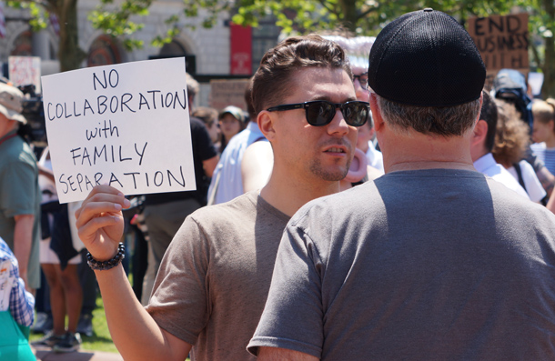 Wayfair protester with family-separation sign