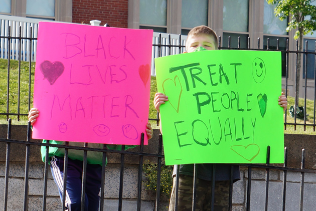 Treat People Equally sign