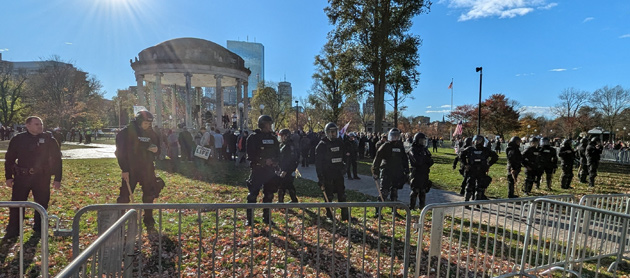 Cops ready for the worse ring the bandstand