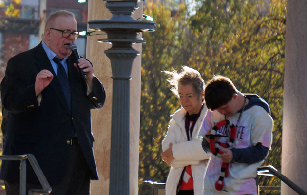 Man talking on bandstand